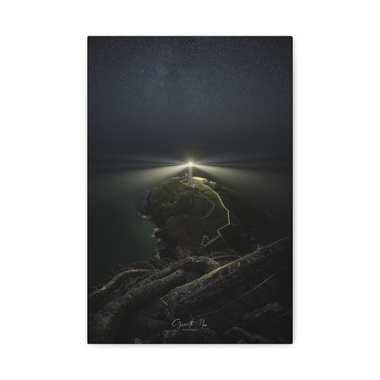 South Stack Milky Way By Photographer Gareth Mon Jones | Lighthouse Beam Beneath a Star-Filled Sky