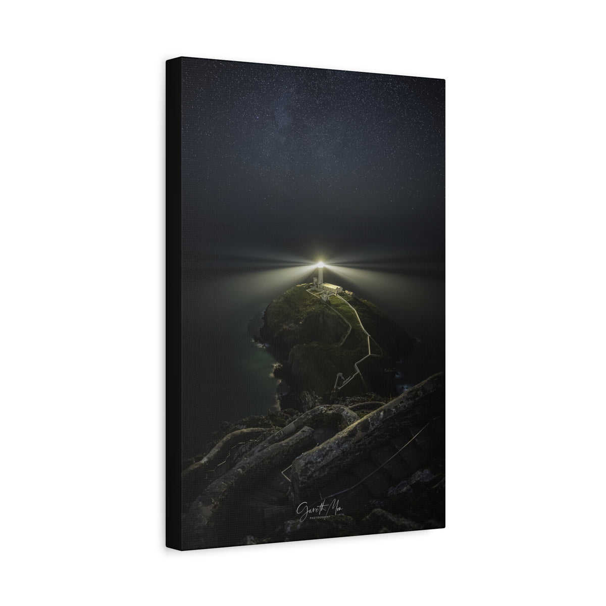 South Stack Milky Way By Photographer Gareth Mon Jones | Lighthouse Beam Beneath a Star-Filled Sky